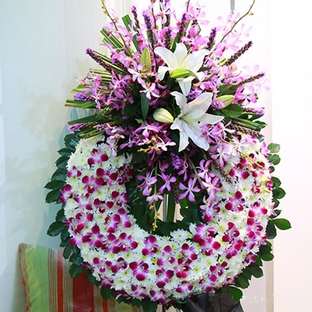 Funeral wreath purple and white