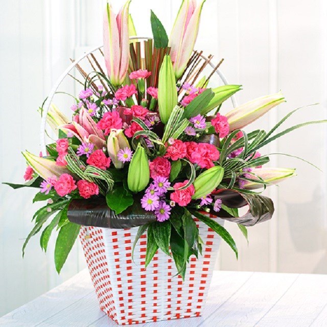 product image for Pink and Purple bouquet in container
