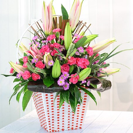Pink and Purple bouquet in container