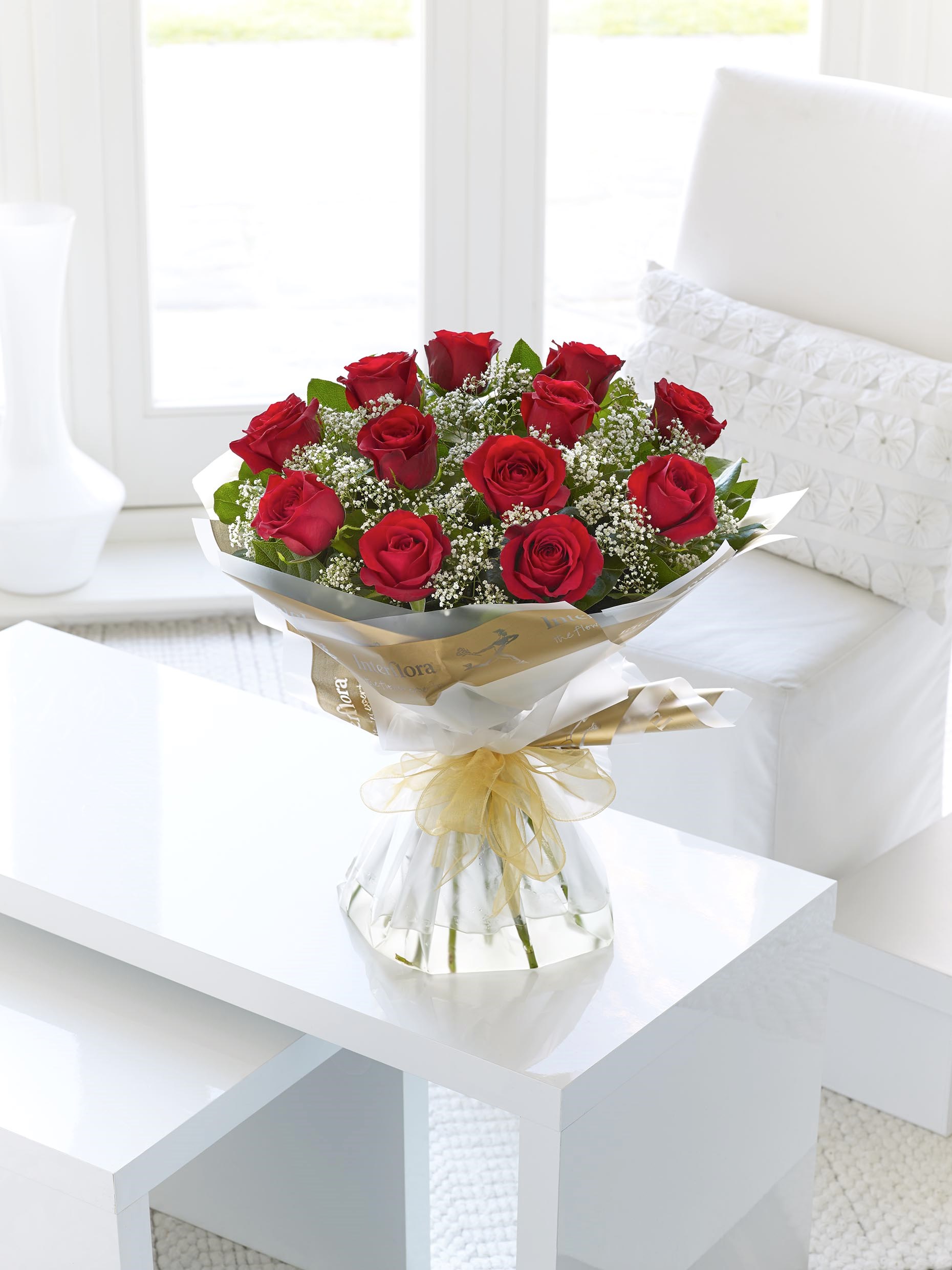 product image for 12 Red Long Stem Roses Hand Tied