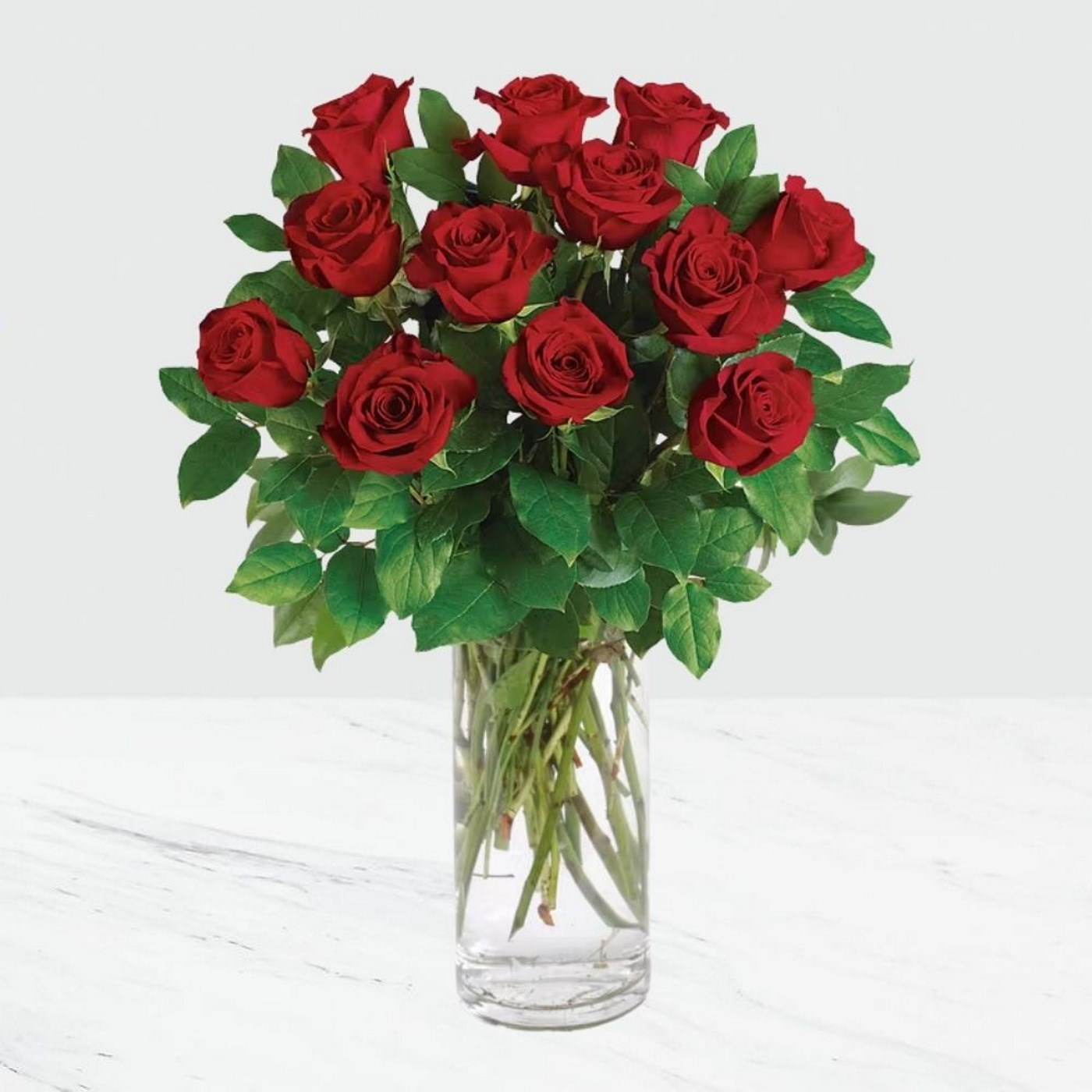 12 Red Roses In A Vase Mozambique Interflora Eesti Flower Delivery