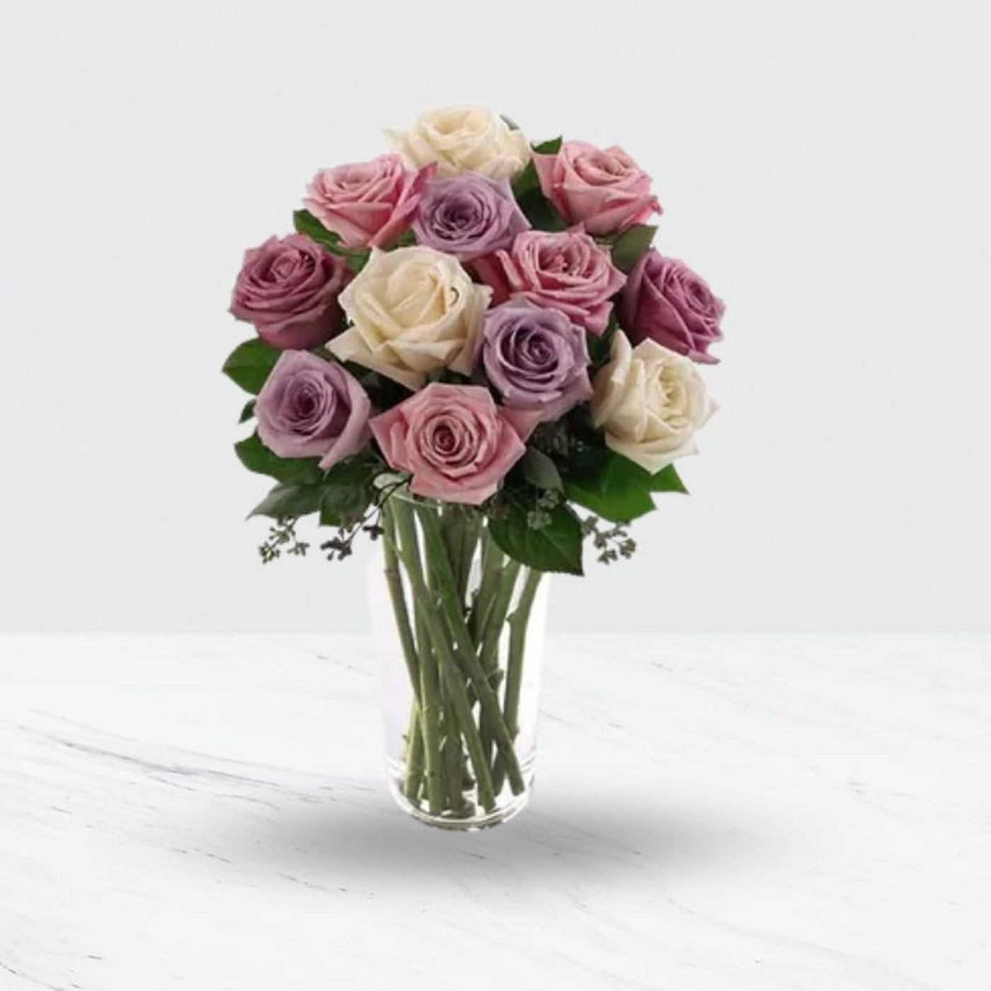 12 Pink and Purple roses in a vase
