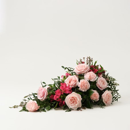 Low Funeral Arrangement in pink