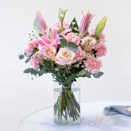 Mixed bouquet with roses and lilies