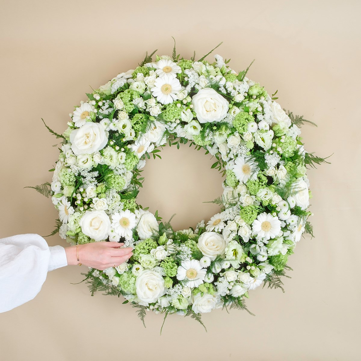 Funeral wreath with roses and gerberas