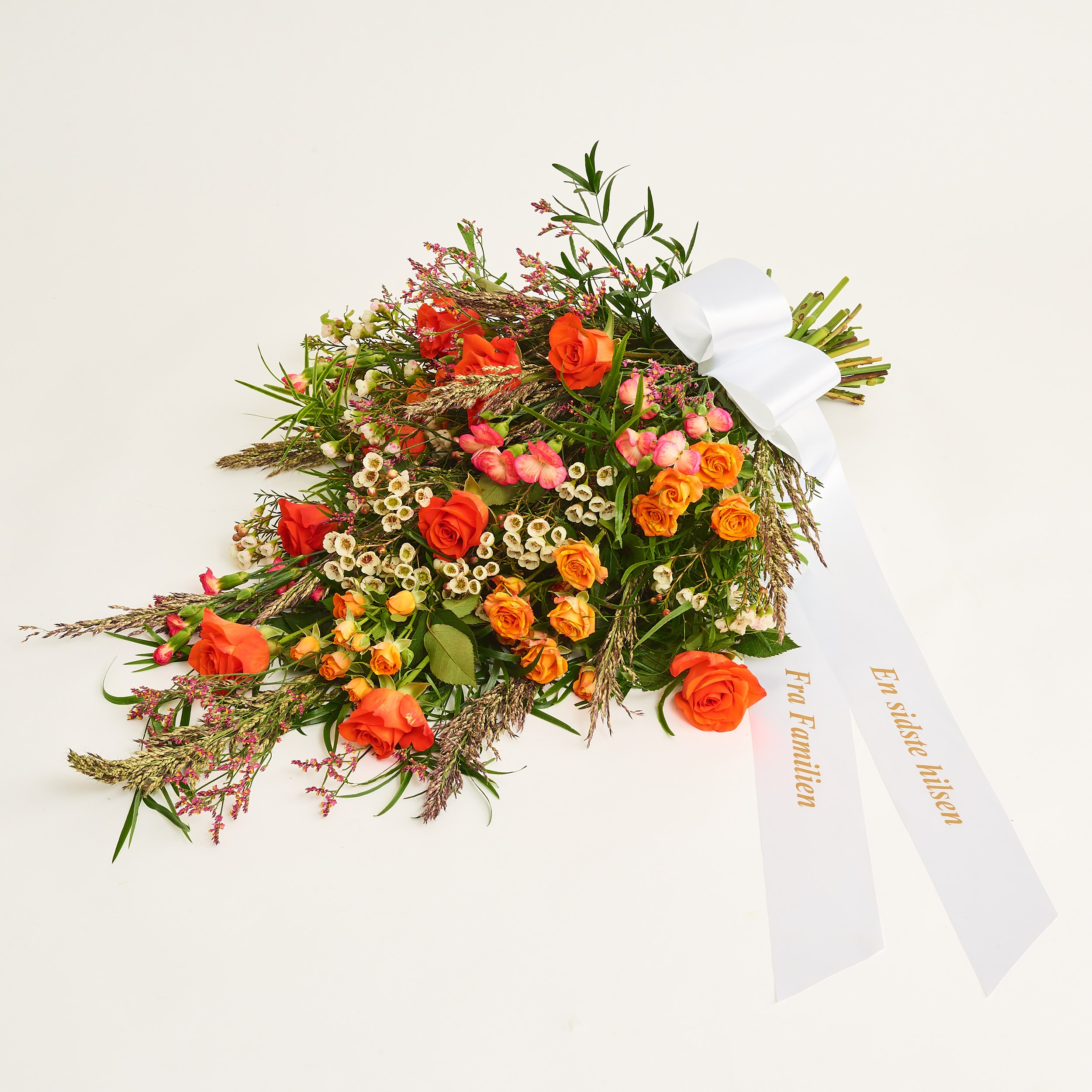 Funeral spray golden with ribbon