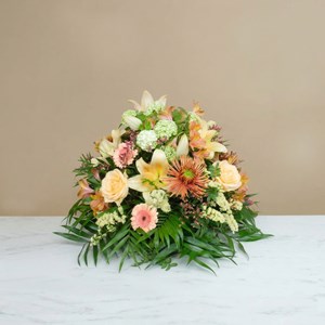 Funeral composition in gold tones